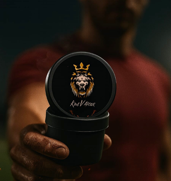 King Vapour Rub tub held by athlete